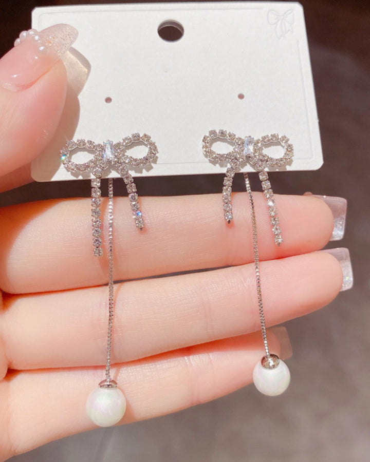 国内発送/著名人愛用☆OHTNYC☆クリスタル パール ポン ピアス☆ ストーンリボン＆パールスイングピアス PRCL905998｜Cummel